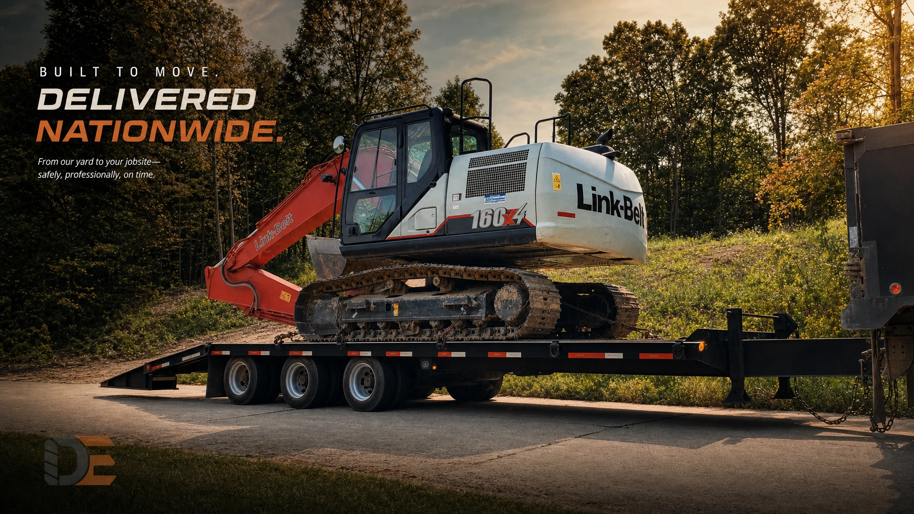 Excavator secured on a heavy-equipment trailer as an example of coordinated equipment delivery